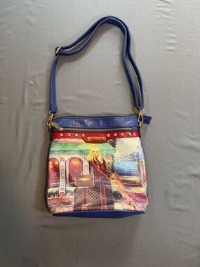 Blue Illustrated Crossbody Bag with Traveler Print and Gold Accents
